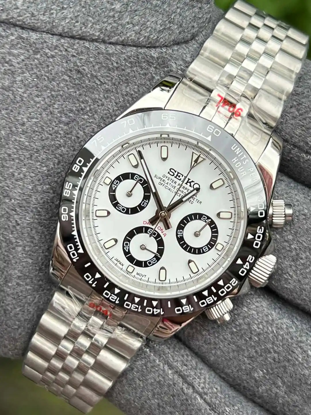 Silver Seiko chronograph watch.