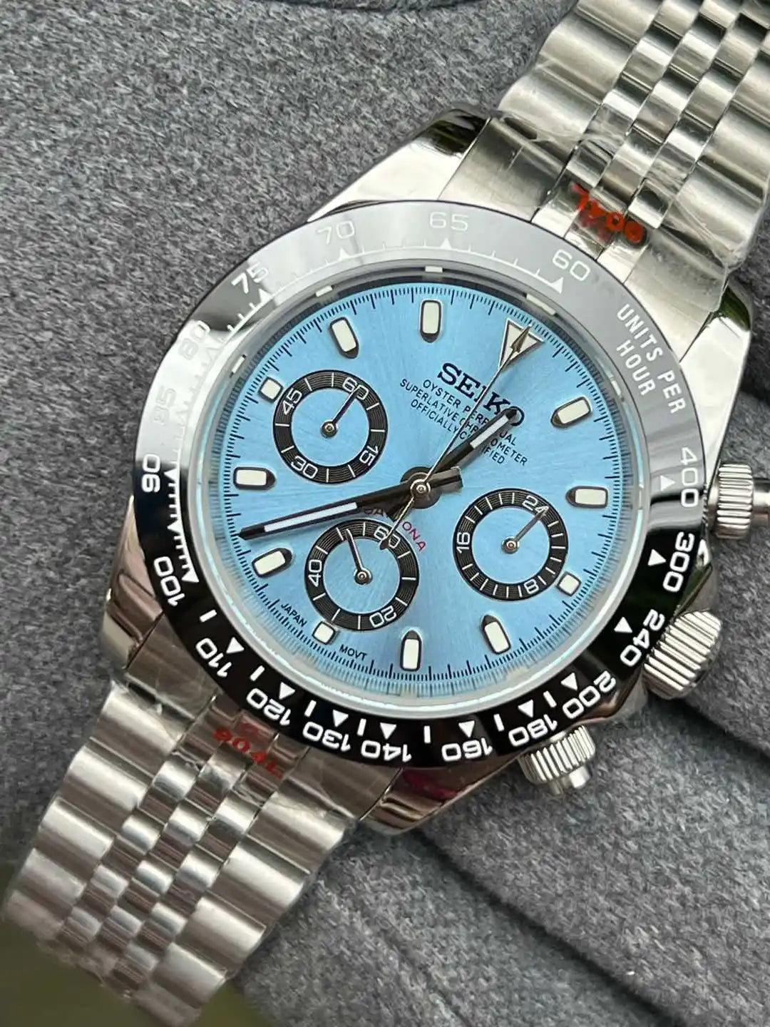 Silver Seiko chronograph wristwatch with a light blue face.