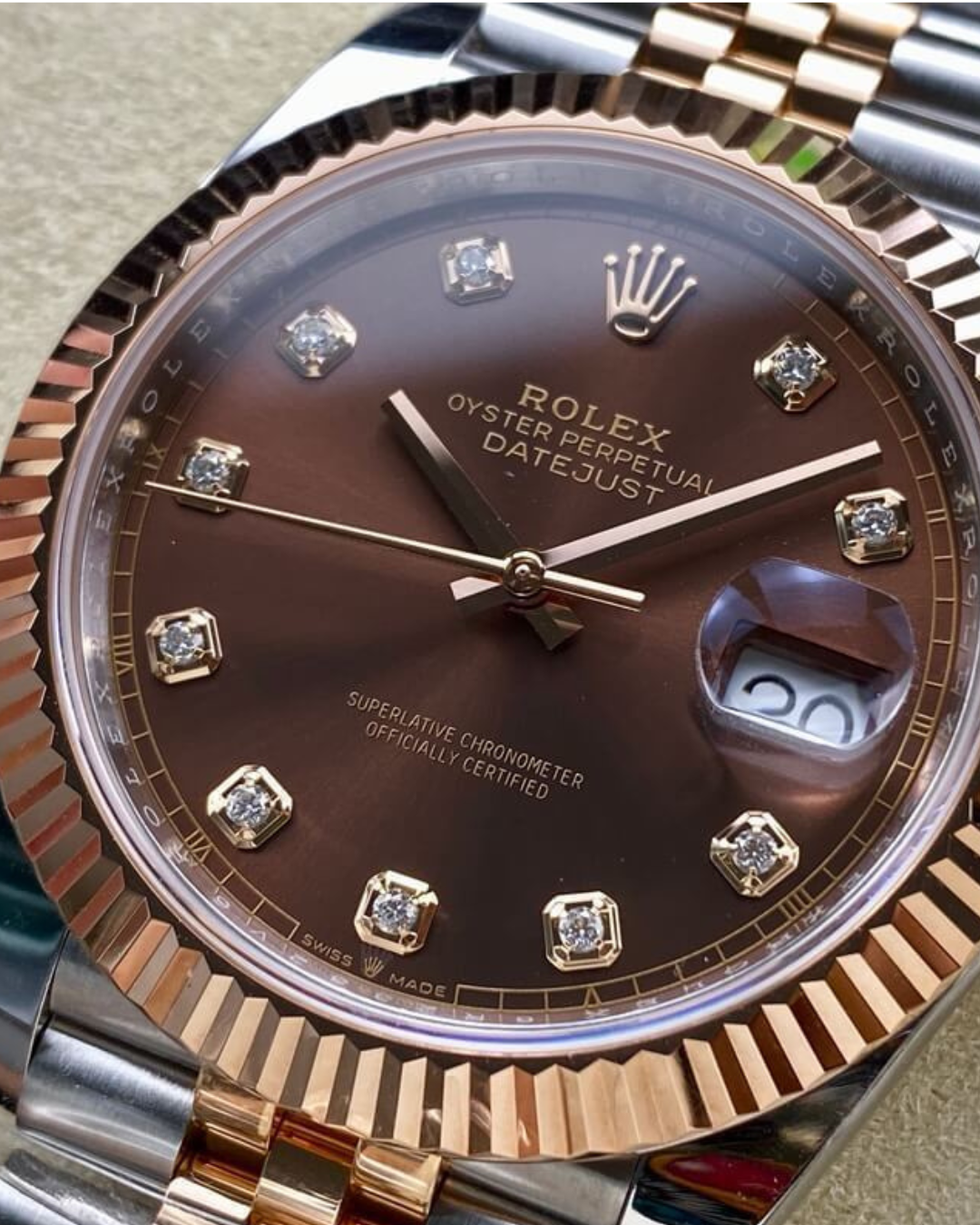 Rolex Date-Just 36mm watch with chocolate brown diamond dial and rose gold fluted bezel